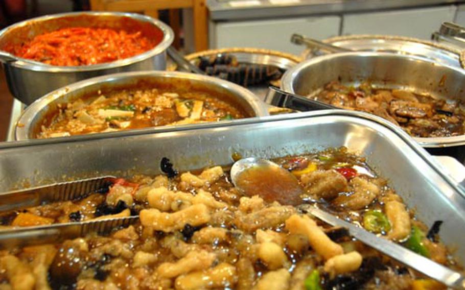 Vegetarian dishes at SM Vegetarian Restaurant in Seoul include kimbap and bulgogi. The "meat" is made of soy and wheat.