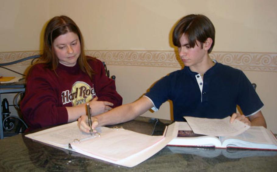 Trevor and his mother, Gwen, complete schoolwork at home. Since dance classes interfere with traditional school hours, Gwen Martin home-schools Trevor.