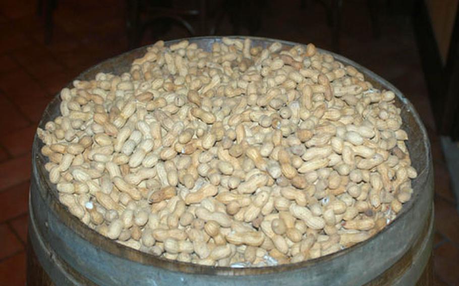Grab a few handfuls of peanuts while you’re waiting for your meal at the Rooster House Restaurant. The restaurant specializes in chicken and beer, but peanuts are free.