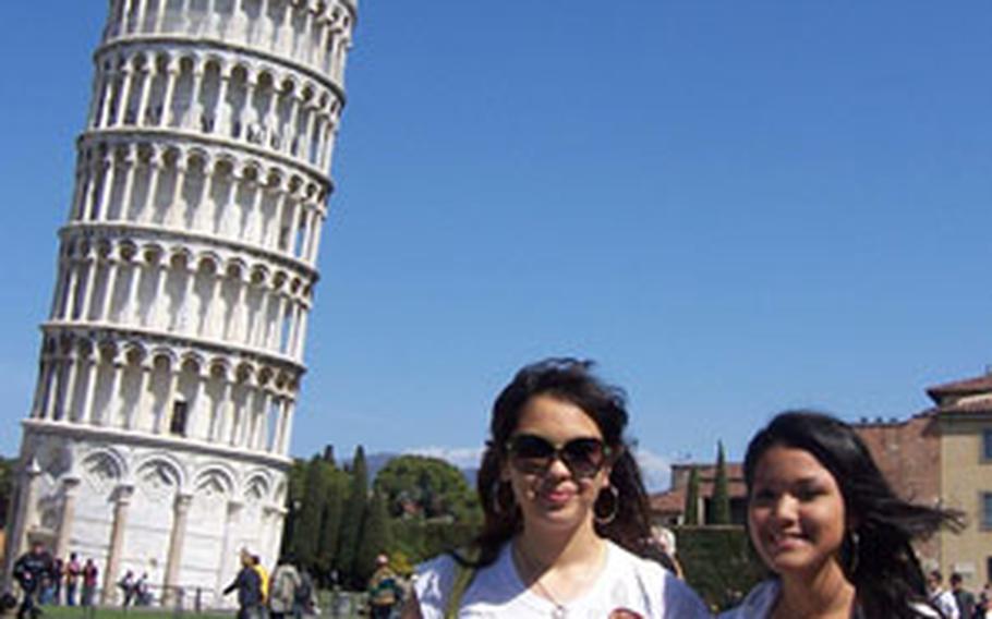 Emily Carpenter, 16, and Erika Natal, 17, enjoy gelato near the Leaning Tower of Pisa.