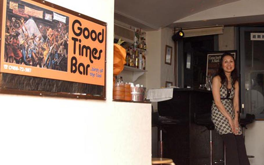 The Good Times in Zushi has a living-room feel. Here, bartender Namie Ochiai, wait for customers in the small bar.