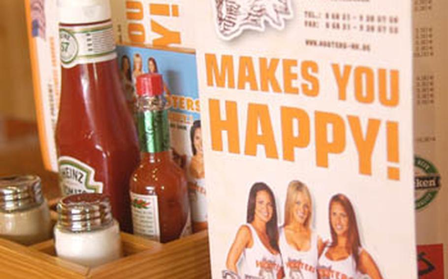 The menu at Hooters in Neunkirchen, Germany features traditional sportsbar food. Like many Hooters fans, this reporter "came for the wings."