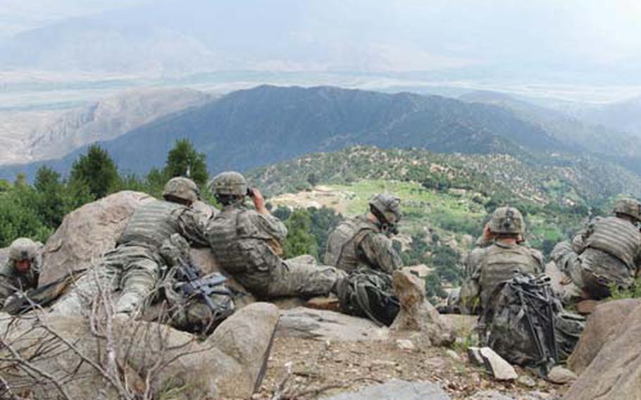 Paratroopers from 2nd Platoon, Battle Company, 2nd Battalion, 503rd Infantry Regiment (Airborne), conduct a patrol in the Korengal Valley, Afghanistan June 10.