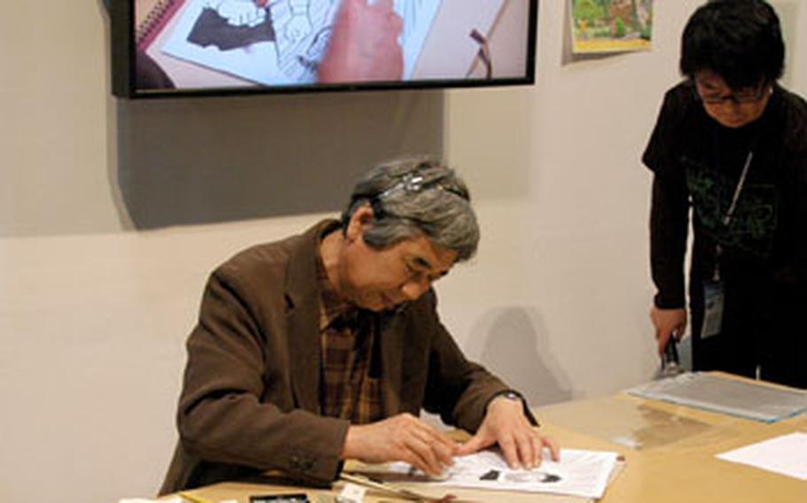 A manga, or Japanese comic book, artist gives an art demonstration at the 2009 Tokyo International Anime Fair. Nearly 130,000 people attended this year&#39;s fair to check out the latest in Japanese animation.