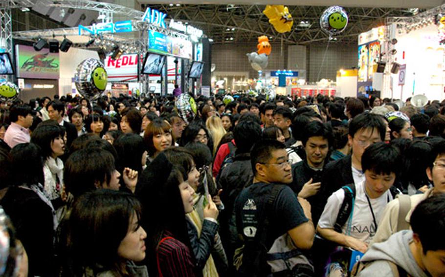 Fans pack the hall of Tokyo Big Site, home of the 2009 Tokyo International Anime Fair.