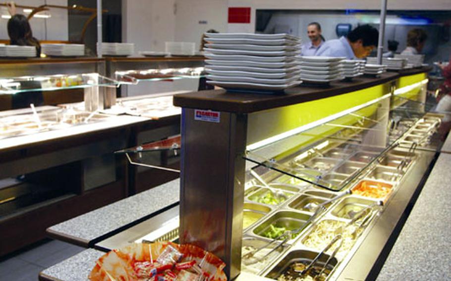 Shogun Sushi-Wok has two main buffet lines for customers. The one on the right contains raw ingredients that a chef will cook and the one to the left features a variety of precooked Asian specialties.