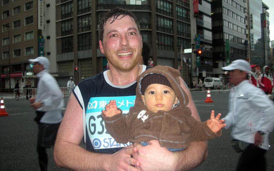 In Nihonbashi, runner and writer Paul Newell finally saw his family, something he describes as a huge pick-me-up. He’s pictured with his 8-month-old, Alex.