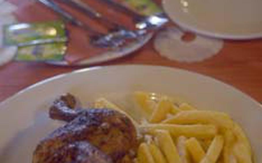 A plate of chicken and fries awaits destruction. Call ahead early in the week to make reservations for the Friday-night chicken feast.