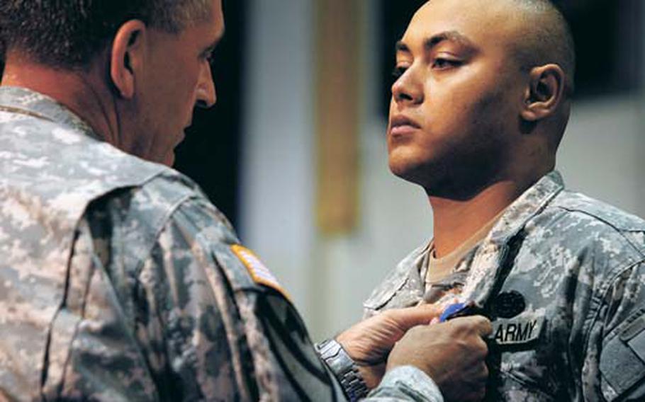 Staff Sgt. Christopher B. Waiters receives the Distinguished Service Cross.
