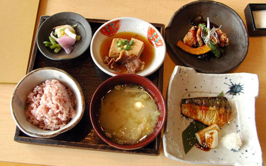 A standard teishoku-style set of fish, rice, miso soup, tofu and pickled vegetables at Itto Gokoku.