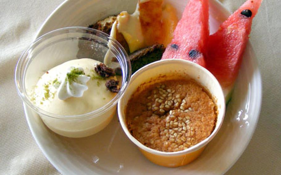 A heart-healthy dessert dish of mousse, watermelon slices and pudding.