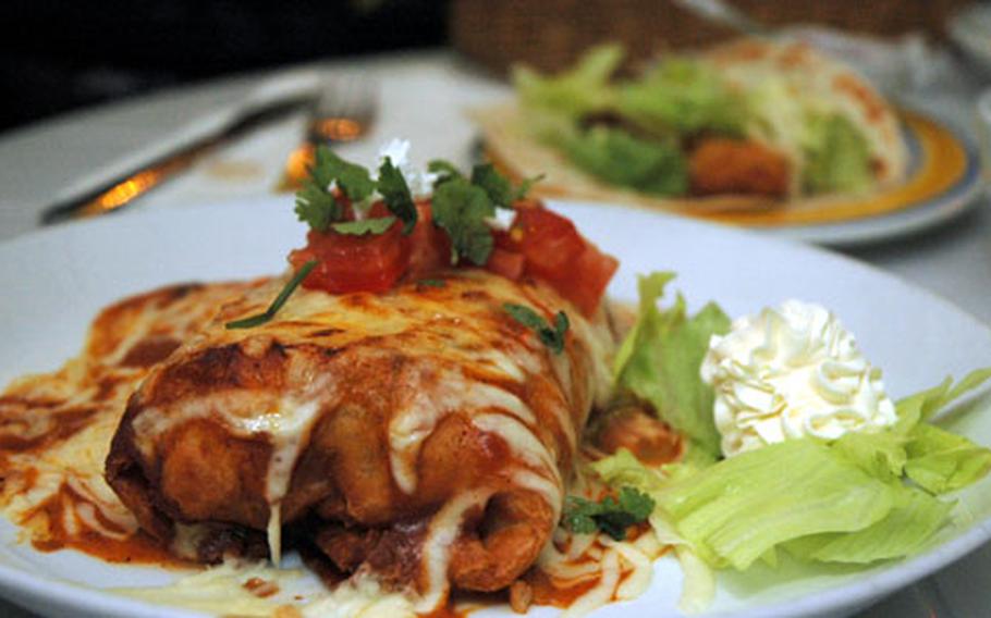 The special chimichanga: a mix of beef and chicken, with beans and cheese, wrapped in a tortilla and fried.