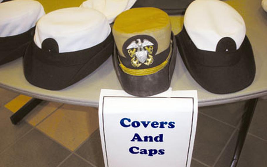 Hats galore were on sale at last week’s used uniform sale on Capodichino in Naples.