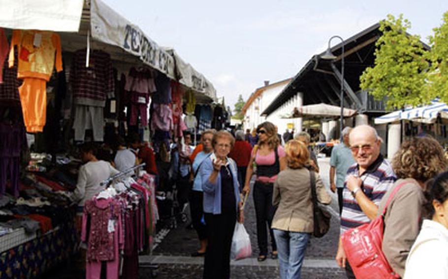 Small towns and large cities across Italy hold weekly markets such as this one in Porcia, Italy. Fresh fruits and vegetables and a variety of clothing are just a sample of what’s on sale every Friday in Porcia, a short drive from Aviano Air Base.