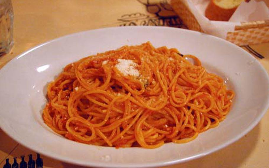 Spaghetti with tomato, basil and Parmesan is a house specialty at Un Quinto, just outside Yokota Air Base. Like most dishes served at the small Italian eatery, the food is authentic and dished up in hearty portions.