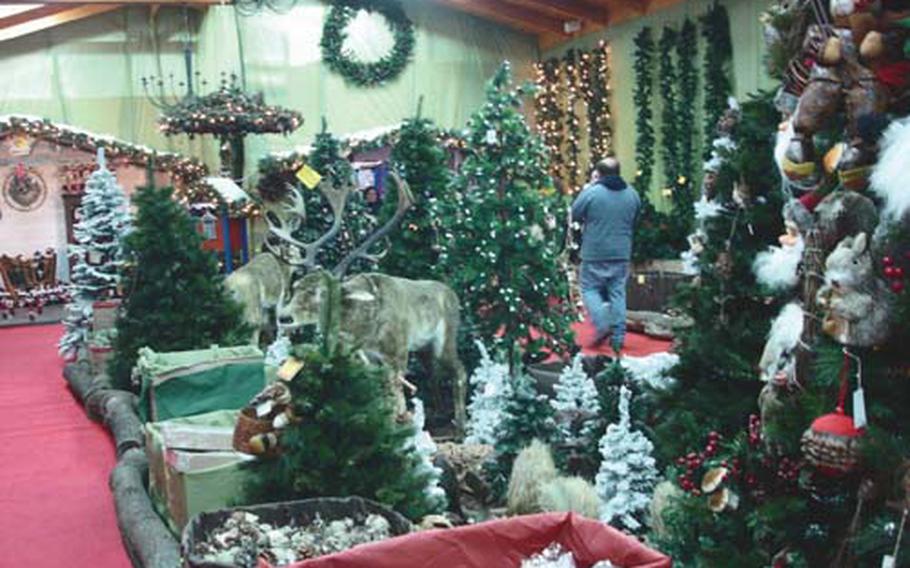 Realistic-looking trees and reindeer, along with everything else needed for holiday decorating, is available at Gloria, a store that sells outdoor furniture the rest of the year, but Christmas items during this season.