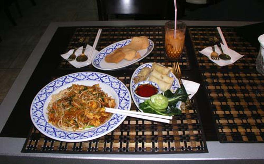 Pad Thai with chicken, left, and spring rolls are two of the stars on the menu at Thailand 2 Restaurant near Osan Air Base, South Korea.
