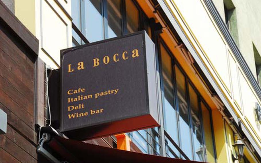 La Bocca sign seen is a standout in its neighborhood of often overpriced restaurants.