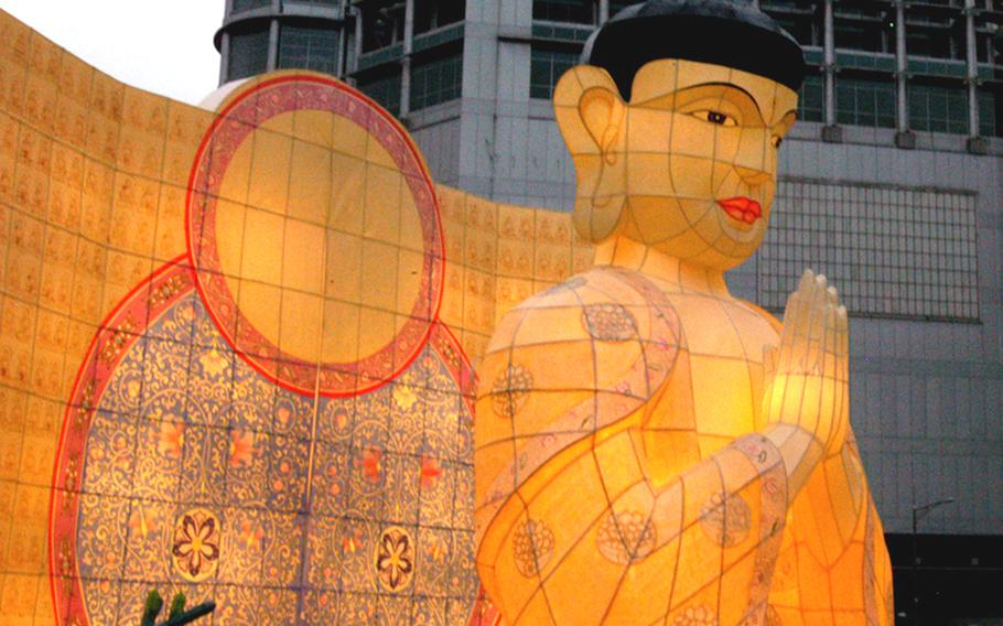 Thousands of statuesque, glowing images of dragons, white elephants, lotus flowers and praying Buddhas made their way through downtown Seoul on May 16 during the 2010 Lotus Lantern Parade.
