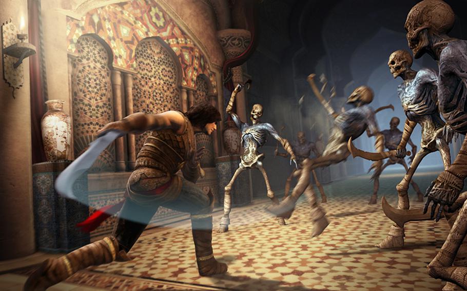 The Prince swings at warriors created from the desert sands in “Prince of Persia: The Forgotten Sands.”