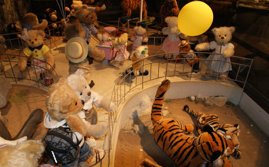 Teddy bears enjoy a day at the modern-day 'Children's Grand Park' in this display found at the Teddy Bear Museum.