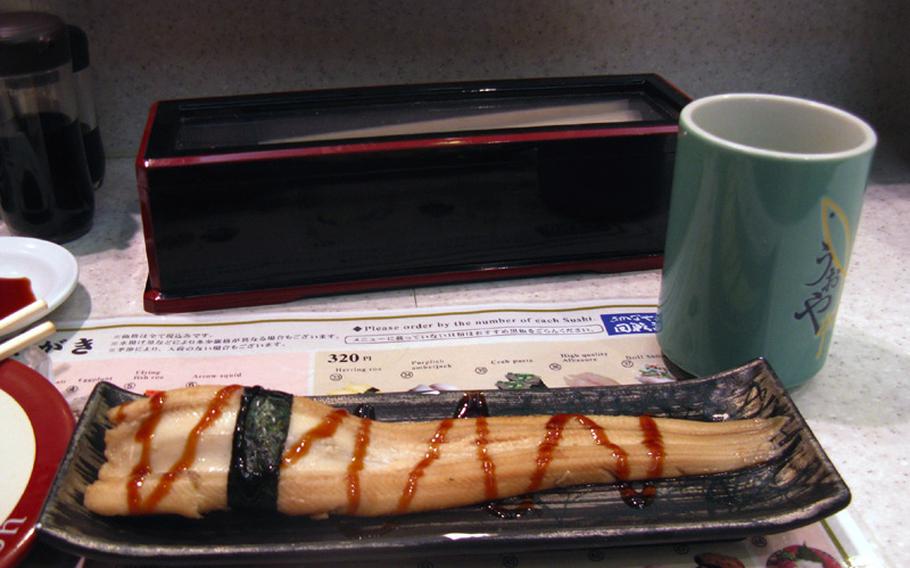 Anago, or conger eel, is a good choice at Kaiten Zushi Uoki, located on the ground floor below the Yokosuka Chuo Station main entrance.