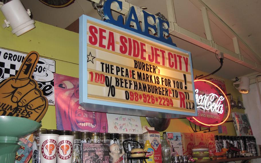 The shelves at Okinawa's Sea Side Jet City Burgers are crammed with American memorabilia.