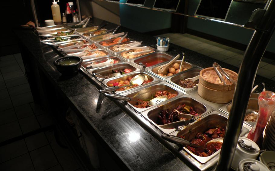 The buffet line at the Coach and Horses Wok n Grill offers a variety of starters, main courses and a variety of rice and noodles. Also, not pictured is a small dessert area with fresh fruit, ice cream and assorted cakes.