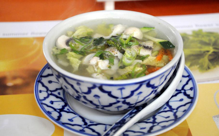 This soup, served as an appetizer, consisted of a clear broth filled with mushrooms and vegetables.