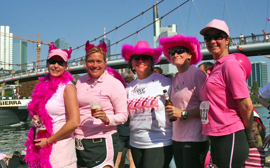 A group of runners relax after last year&#39;s Race for the Cure in Frankfurt.
