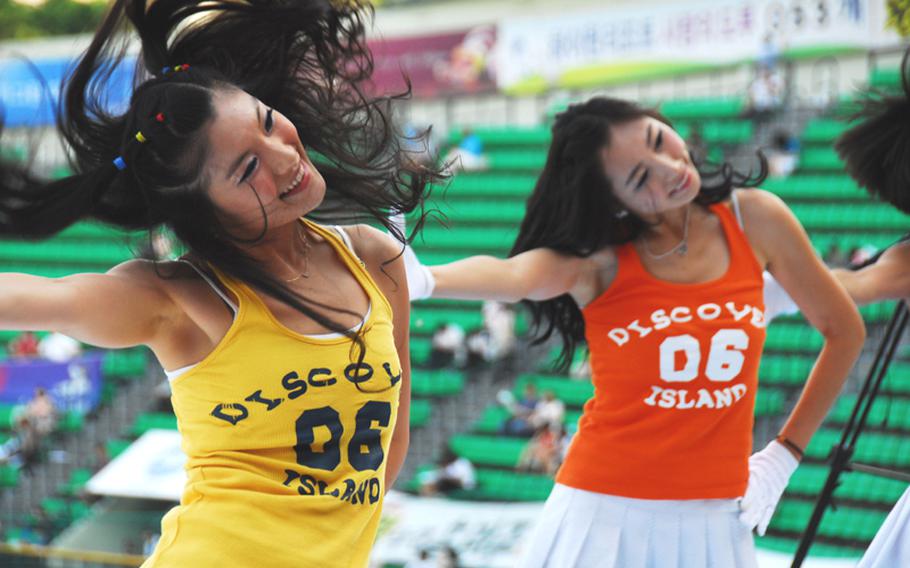 Cheerleaders for the Doosan Bears perform during a game in Seoul. Professional baseball teams in South Korea have cheerleaders, unlike American teams.