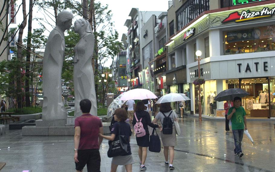 Over the past year, a four-lane street was ripped up in Uijeongbu in South Korea and replaced by a heavily landscaped promenade that also features large statues, pieces of art, a creek, a fountain and poles and a tunnel-like structure that flash media images. The area is now known as 'Culture Street.'
