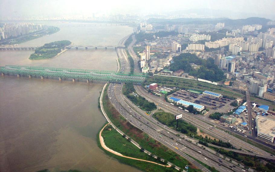 One of the views available from the top floor of the 63 Building in Seoul, South Korea, is of the Han River snaking its way through the center of the city.