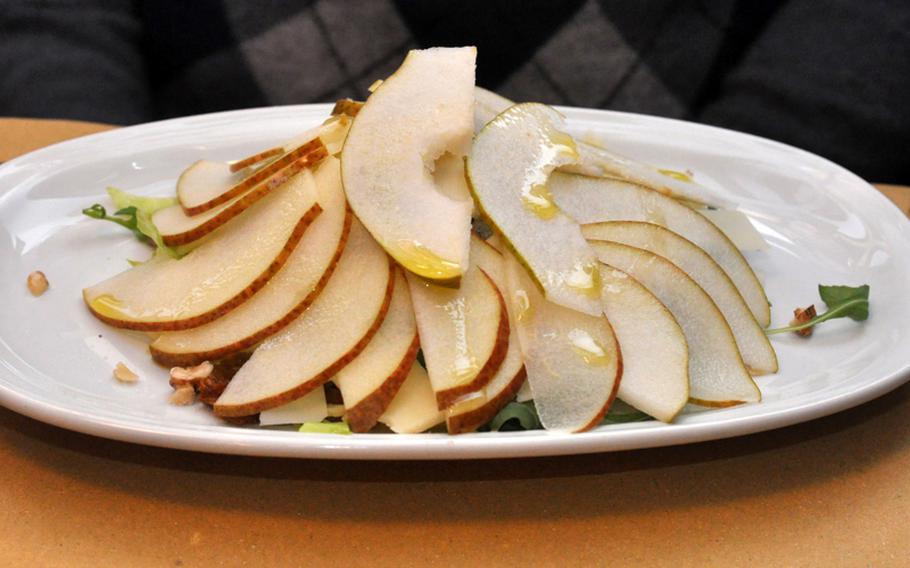 This salad  served at La Bitta Enoteca and Trattoria, a restaurant about a block east of Piazza San Barnaba in Venice, Italy, features pears, cheese and dried figs.