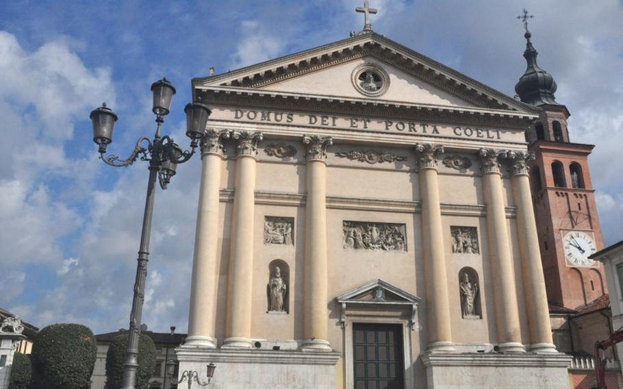 Just like most buildings in Cittadella, Italy, the cathedral is composed mainly of red bricks. But the facade that faces Piazza Perobon -- the main square -- hides that well.