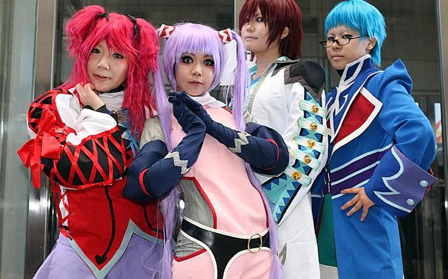 Many of the fans at the Tokyo Game Show 2010 came in costume on Saturday, including these young Japanese women.