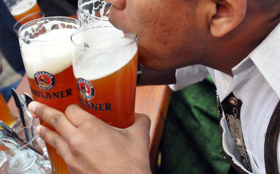 For Marine Sgt. Justin Sanders, one beer at a time wasn&#39;t enough during the first day of the 200th anniversary of Munich&#39;s Oktoberfest. Sanders and other Marines came to the fest from Stuttgart, Germany,and spent most of their time there sitting in a beer garden drinking and talking with locals.