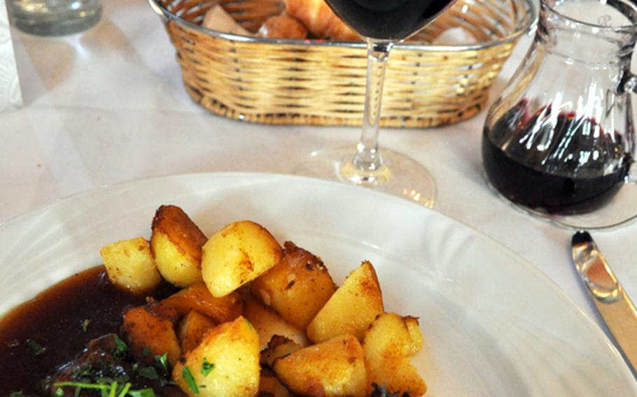 One of the the lunch specials at the Aspendos Turkish restaurant in Stuttgart, Germany, was a roast beef dish with fried potatoes and a salad.