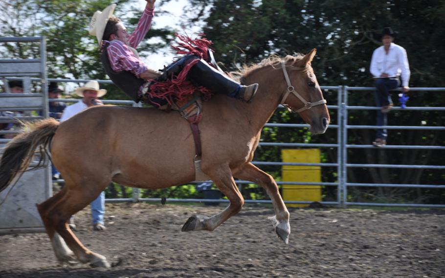 German Patrick Göschel rides Mustang Sally bareback during the recent rodeo event in Russheim, Germany.
