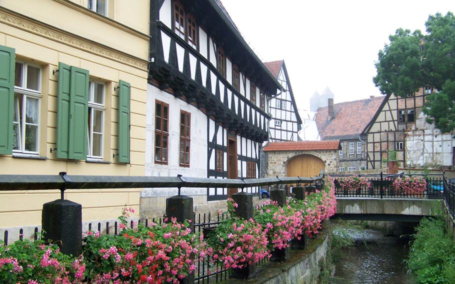 This colorful corner of Quedlinburg, Germany, is only steps from the town's main market square. Complete with a small stream, flower boxes and half-timbered buildings, it is one of many picture-perfect sites in Quedlinburg.