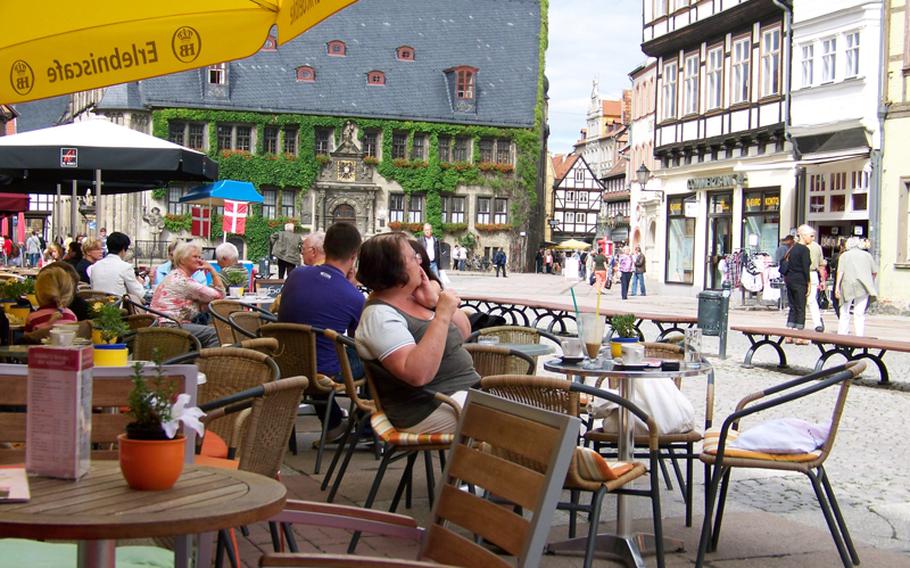 Modern cafes and restaurants around the old town square in Quedlinburg offer customers a view of the past in a relaxing setting of half-timbered architecture.