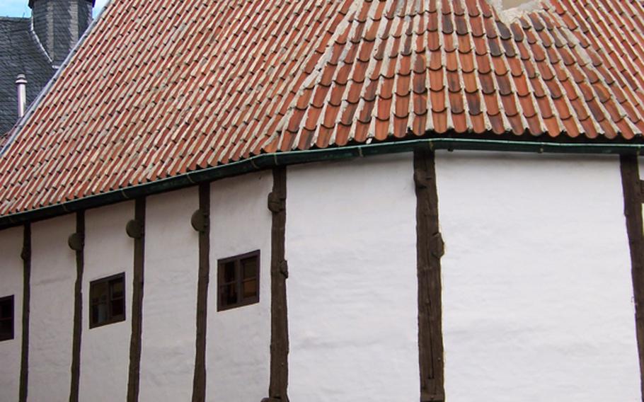 Among the hundreds of half-timbered buildings in Quedlinburg is this rather plain structure, built around 1320, which the city says is the oldest half-timbered house in Germany. Today it houses a museum that showcases the different types of half-timbered styles. Half-timbering is a distinctive decorative style using exposed wood framing. The spaces between the wooden timbers are filled with plaster, brick or stone. 