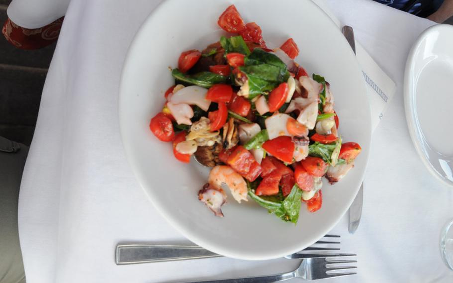 Fresh mussels, clams, tomatoes, basil and garlic top lightly toasted bread for a mouth-watering appetizer at Chalet Primavera, on the Neapolitan island of Ischia.