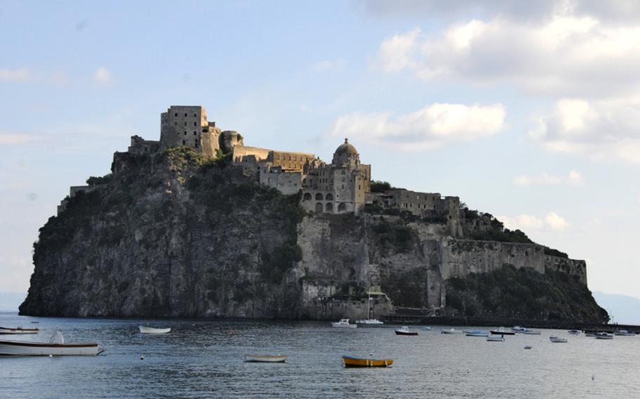 Sun breaks through the clouds to shine on Castello Aragonese,which was built in 474 B.C. and has served as a fortress, church and now Ischia's most-visited monument. It can be seen from the dining area of the Chalet Primavera.