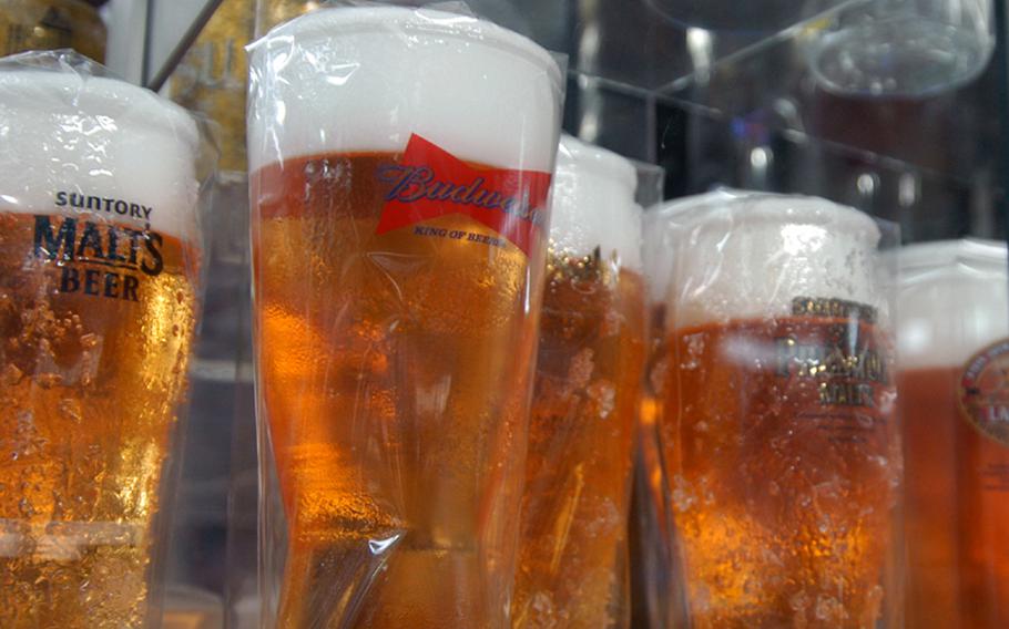 Fake, plastic beer displays resemble the real thing in Kappabashi, where there are many stores that sell realistic-looking, plastic food displays.