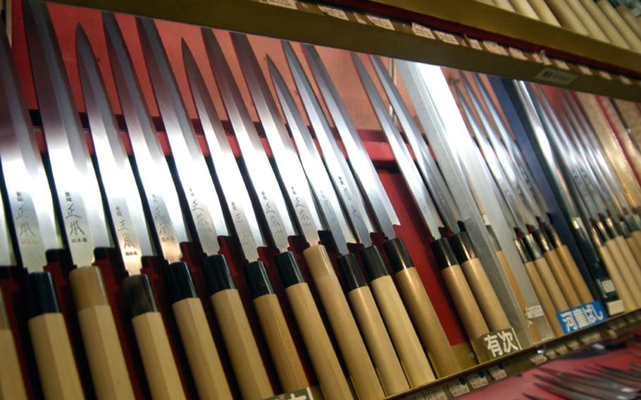 Various knives are displayed at a store in Kappabashi. You can find daily-use and professional knives at Kappabashi.