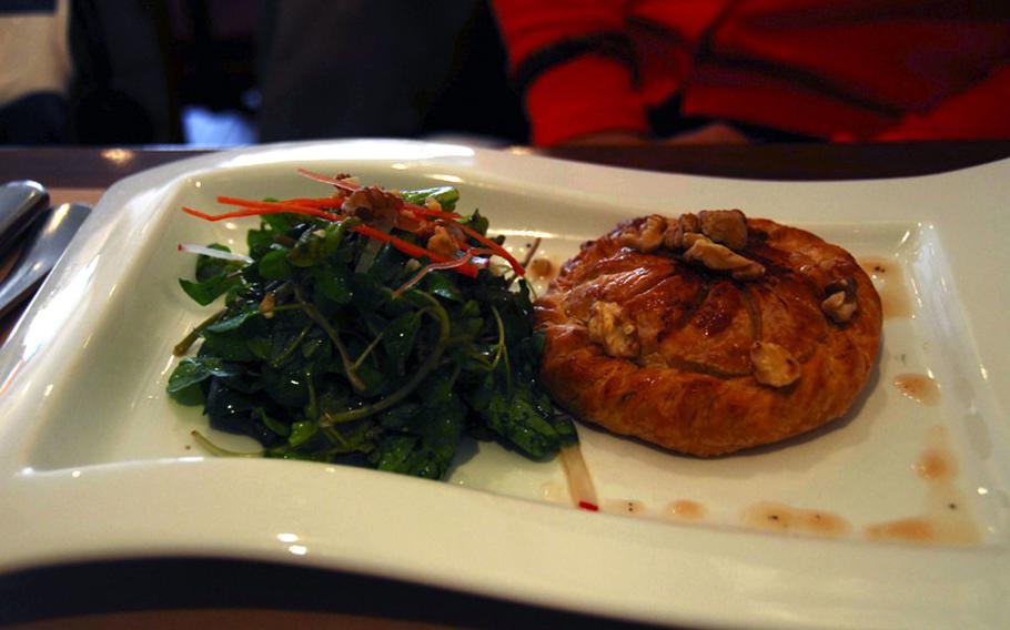 A potato- and blue cheese-filled pie and side salad at Le Saint-Ex restaurant in Itaewon, a nightlife district just outside Yongsan Garrison in Seoul.