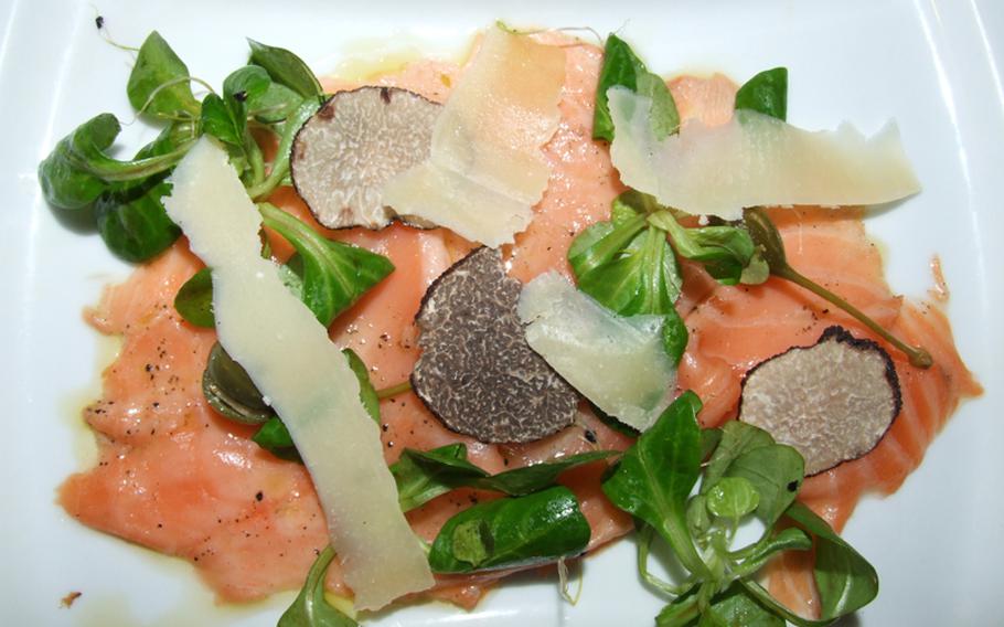 A delicacy: smoked salmon with truffle slices. Truffles have an earthy taste, which gets stronger as the fungus matures. Truffle season runs from November to March, but experts say they aren't really ready until Christmas.