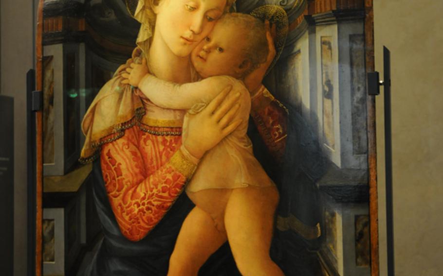 A 15th-century painting by Filippo Lippi titled Madonna with Child is on display at the Medici Riccardi Palace. The wealthy Medici family helped make Florence a center for art, as well as commerce, political intrigue and religious power.