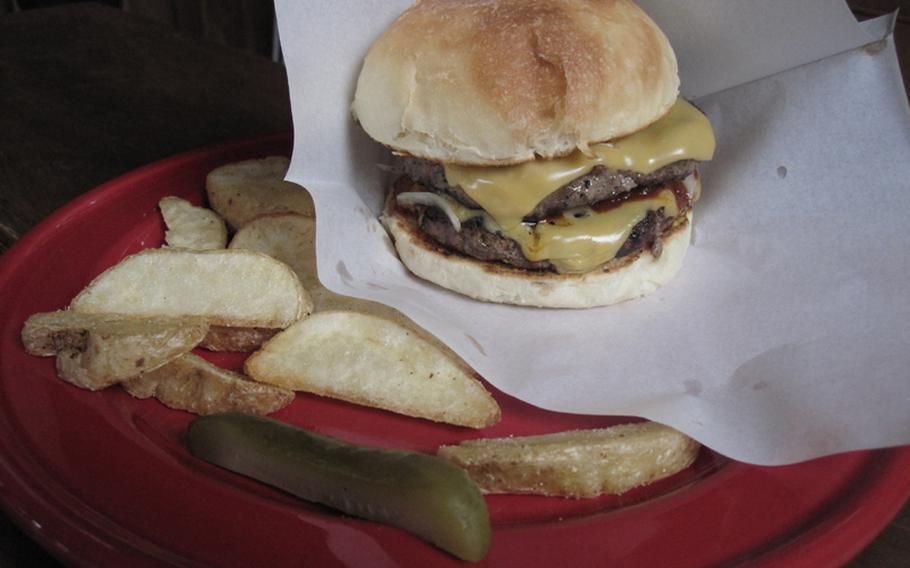 The double beef cheeseburger at Gordie's Hamburger, which came with seasoned fries and a pickle, was delicious.